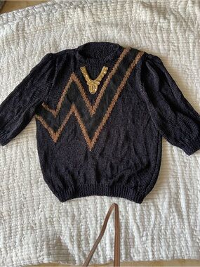 Handknitted in Silk thread sophisticated top , with gold details - one of a kind